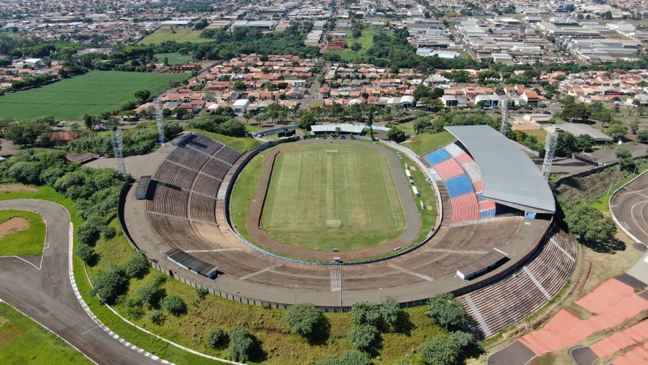 Explore the majestic Estádio do Café in Londrina, Brazil from above, showcasing its iconic architecture.