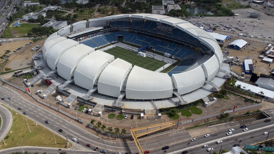 Aerial shot of Arena das Dunas stadium in Natal, Brazil, showcasing its modern architecture.